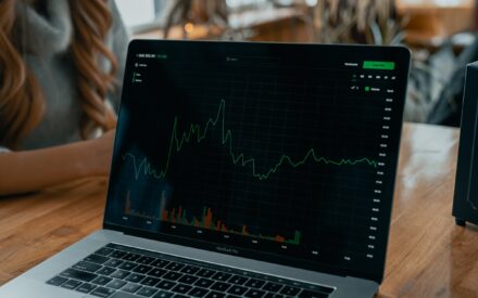 Computer showing economic graphs