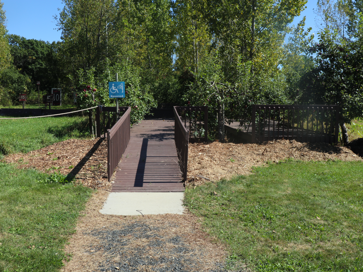 A wheelchair accessible apple picking platform