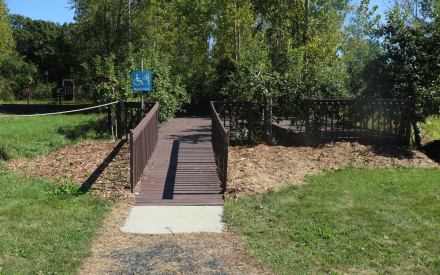 A wheelchair accessible apple picking platform